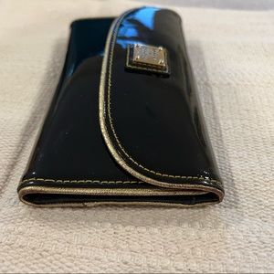 Sold sold sold! Dooney & Bourke Black Patent Leather Wallet W/Gold Trim